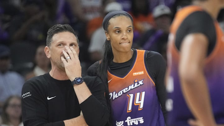 Phoenix Mercury head coach Nate Tibbetts talks with forward DeWanna Bonner (14) during the fourth quarter against the Minnesota Lynx at PHX Arena on July 9, 2025.