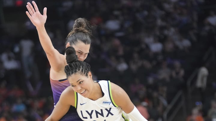 Phoenix Mercury forward Kathryn Westbeld (24) defends against Minnesota Lynx forward Napheesa Collier (24) during the third quarter at PHX Arena on July 9, 2025.