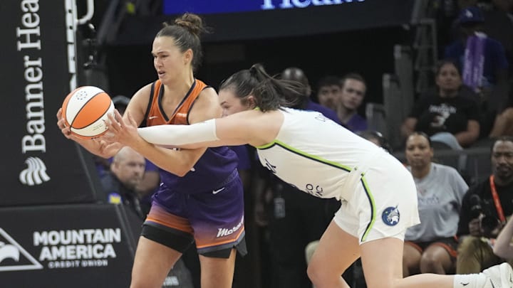 Phoenix Mercury forward Kathryn Westbeld (24) has the ball knocked away by Minnesota Lynx forward Bridget Carleton (6) during the fourth quarter at PHX Arena on July 9, 2025. Phoenix Mercury forward Kathryn Westbeld (24) has the ball knocked away by Minnesota Lynx forward Bridget Carleton (6) during the fourth quarter at PHX Arena on July 9, 2025.