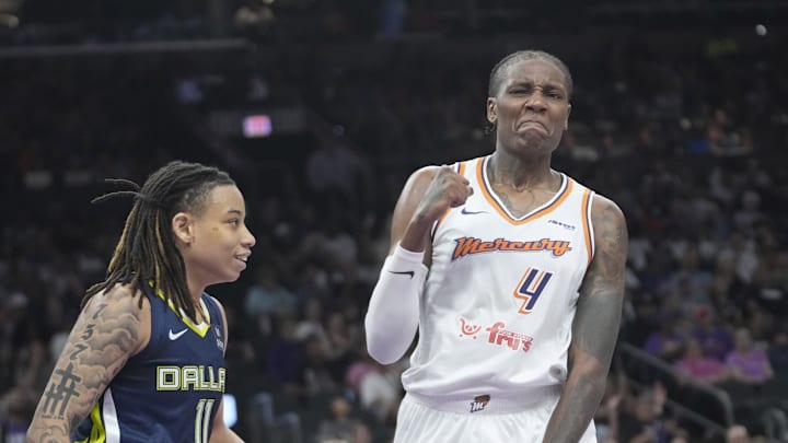 Phoenix Mercury forward Natasha Mack (4) celebrates after blocking a shot by Dallas Wings guard JJ Quinerly (11) during the second quarter at PHX Arena on July 7, 2025. Phoenix Mercury forward Natasha Mack (4) celebrates after blocking a shot by Dallas Wings guard JJ Quinerly (11) during the second quarter at PHX Arena on July 7, 2025.