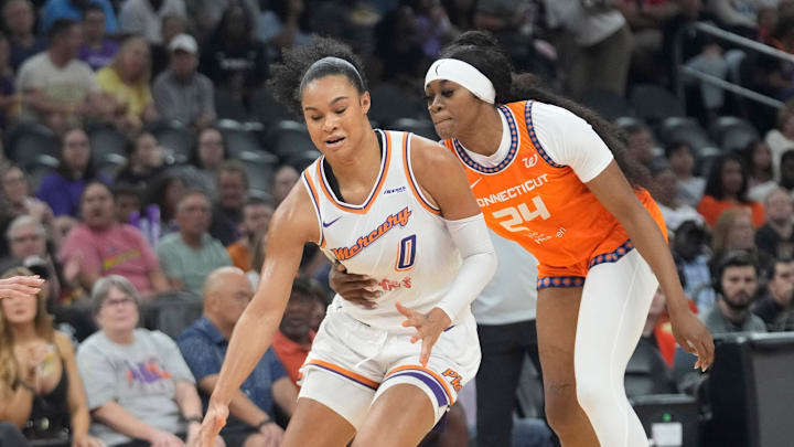 Phoenix Mercury forward Satou Sabally (0) is fouled by Connecticut Sun forward Aneesah Morrow (24) during the first quarter at PHX Arena on Aug. 5, 2025, in Phoenix. Phoenix Mercury forward Satou Sabally (0) is fouled by Connecticut Sun forward Aneesah Morrow (24) during the first quarter at PHX Arena on Aug. 5, 2025, in Phoenix.
