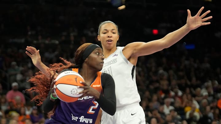 Phoenix Mercury guard Kahleah Copper (2) looks to pass around Las Vegas Aces center Kiah Stokes (41) during the fourth quarter at Footprint Center in Phoenix on Sunday, Sept. 1, 2024.