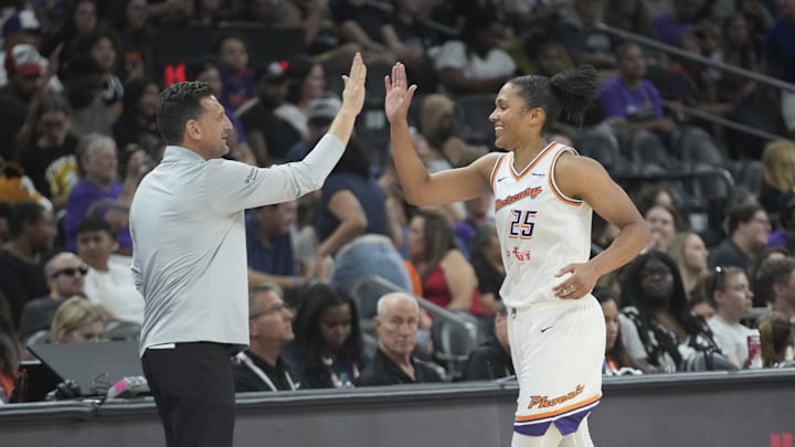 Phoenix Mercury forward Alyssa Thomas (25) is congratulated by head coach Nate Tibbetts after recording a triple-double against the Dallas Wings during the fourth quarter at PHX Arena on July 7, 2025. Phoenix Mercury forward Alyssa Thomas (25) is congratulated by head coach Nate Tibbetts after recording a triple-double against the Dallas Wings during the fourth quarter at PHX Arena on July 7, 2025.