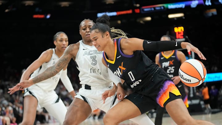 Phoenix Mercury forward Satou Sabally (0) is defended by Las Vegas Aces guard Tiffany Mitchell (3) during the third quarter at PHX Arena Jun 29, 2025.