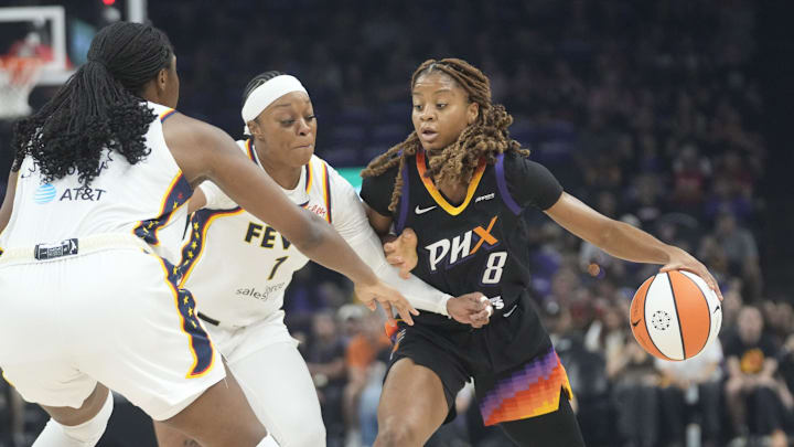 Phoenix Mercury guard Monique Akoa Makani (8) is defended by Indiana Fever guard Odyssey Sims (1) during the first quarter at PHX Arena on Sept. 2, 2025.