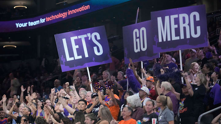 Phoenix Mercury fans cheer for their team against the Los Angeles Sparks during the third quarter at PHX Arena in Phoenix, on May 21, 2025.