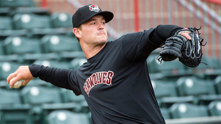 Erie SeaWolves catcher Dillon Dingler throws the ball during the team's workout held on April 6,