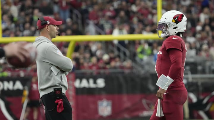 Arizona Cardinals head coach Jonathan Gannon talks with quarterback Kyler Murray during the second quarter against the Seattle Seahawks at State Farm Stadium in Glendale on Jan. 7, 2024.