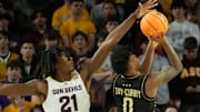 UCF guard Jordan Ivy-Curry (0) has his shot blocked by Arizona State forward Jayden Quaintance (21) during Big 12 play at Desert Financial Arena in Tempe.