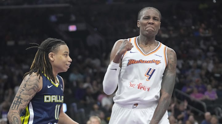 Phoenix Mercury forward Natasha Mack (4) celebrates after blocking a shot by Dallas Wings guard JJ Quinerly (11) during the second quarter at PHX Arena on July 7, 2025.