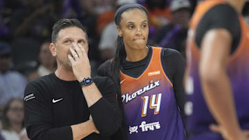 Phoenix Mercury head coach Nate Tibbetts talks with forward DeWanna Bonner (14) during the fourth quarter against the Minnesota Lynx at PHX Arena on July 9, 2025.