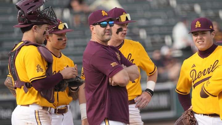 Arizona State manager Willie Bloomquist makes a pitching change during the seventh inning against Ohio State at Phoenix Municipal Stadium on Feb. 16, 2025.