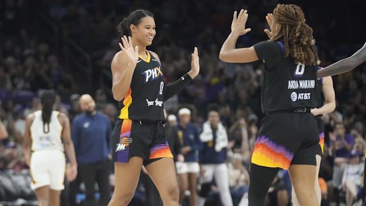 Phoenix Mercury forward Satou Sabally (0) celebrates after a basket with Phoenix Mercury guard Monique Akoa Makani (8) against the Indiana Fever during the second quarter at PHX Arena on Sept. 2, 2025.