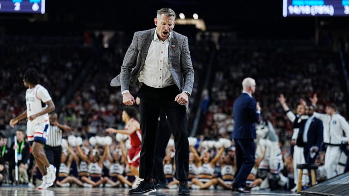 Alabama head coach Nate Oats reacts to a play during the Final Four semifinal game against Connecticut at State Farm Stadium.