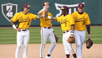 Arizona State players break during a pitching change against Ohio State at Phoenix Municipal Stadium on Sunday, Feb. 16, 2025.