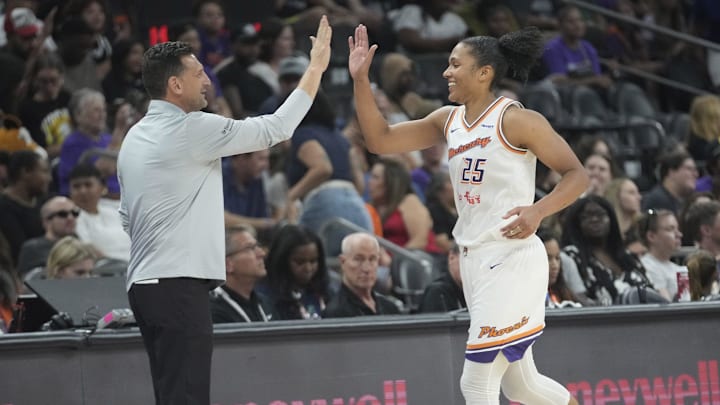 Phoenix Mercury forward Alyssa Thomas (25) is congratulated by head coach Nate Tibbetts after recording a triple-double against the Dallas Wings during the fourth quarter at PHX Arena on July 7, 2025. Phoenix Mercury forward Alyssa Thomas (25) is congratulated by head coach Nate Tibbetts after recording a triple-double against the Dallas Wings during the fourth quarter at PHX Arena on July 7, 2025.
