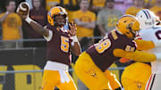 Nov 25, 2023; Tempe, Arizona, USA; Arizona State quarterback Jaden Rashada (5) throws a pass against Arizona during the third quarter at Mountain America Stadium. Mandatory Credit: Michael Chow-Arizona Republic