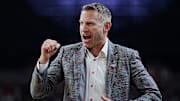 Alabama head coach Nate Oats celebrates a play against Connecticut during the Final Four semifinal game at State Farm Stadium.