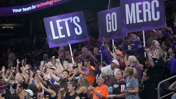Phoenix Mercury fans cheer for their team against the Los Angeles Sparks during the third quarter at PHX Arena in Phoenix, on May 21, 2025. Phoenix Mercury fans cheer for their team against the Los Angeles Sparks during the third quarter at PHX Arena in Phoenix, on May 21, 2025.