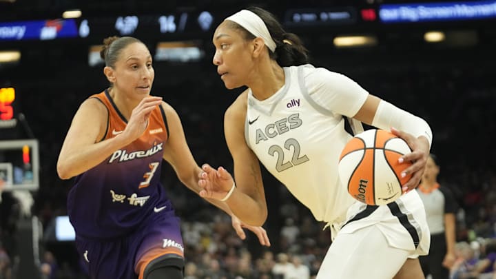 Phoenix Mercury guard Diana Taurasi (3) defends against Las Vegas Aces center A'ja Wilson (22) during the first quarter at Footprint Center on Sept. 1, 2024, in Phoenix.