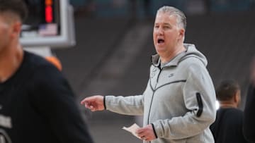 Purdue head coach Matt Painter instructs his team during practice 