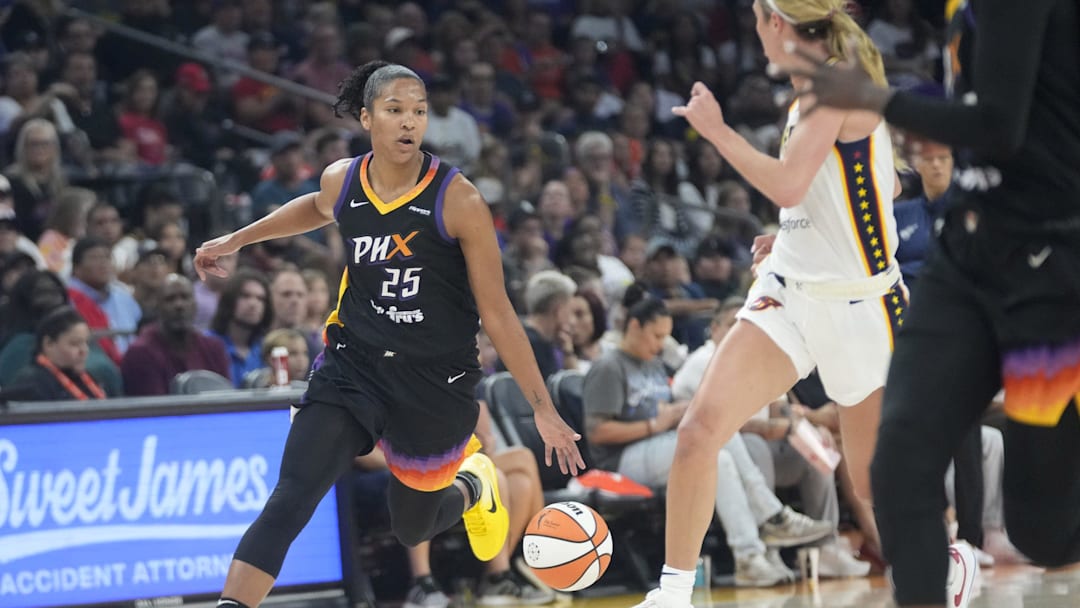 Phoenix Mercury forward Alyssa Thomas (25) is defended by Indiana Fever guard Lexie Hull (10) during the first quarter at PHX Arena on Sept. 2, 2025.