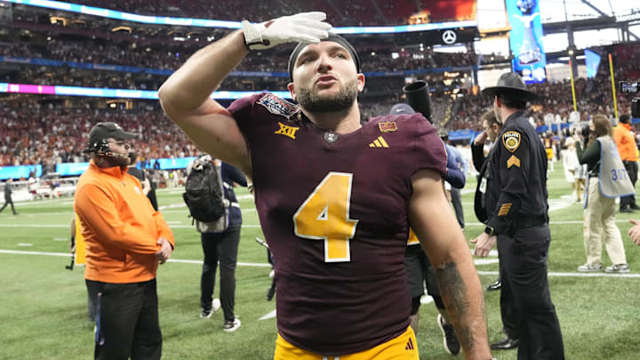 Arizona State running back Cam Skattebo (4) blows a kiss toward fans after Texas won 39-31 in double overtime in the Chick-fil-A Peach Bowl in Atlanta on Jan. 1, 2025.