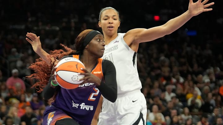 Phoenix Mercury guard Kahleah Copper (2) looks to pass around Las Vegas Aces center Kiah Stokes (41) during the fourth quarter at Footprint Center in Phoenix on Sunday, Sept. 1, 2024. Phoenix Mercury guard Kahleah Copper (2) looks to pass around Las Vegas Aces center Kiah Stokes (41) during the fourth quarter at Footprint Center in Phoenix on Sunday, Sept. 1, 2024.