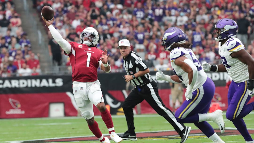 Arizona Cardinals quarterback Kyler Murray (1) throws the ball away under pressure against the Minnesota Vikings during the first quarter in Glendale, Ariz. Sept. 19, 2021.

Cardinals Vs Vikings