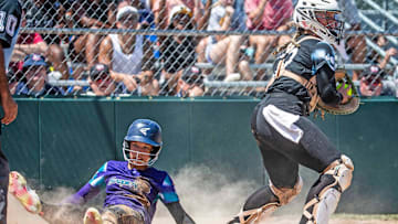Delaware D3 (Lower Sussex) catcher Ryleigh Smith (22) takes out Europe-Africa's (Kennemerland of the Netherlands) Yfke Romney (10) in the quarterfinals of the Senior Little League Softball World Series at the Lower Sussex Little League Complex in Roxana, Friday, Aug. 2, 2024. Delaware won 12-2.