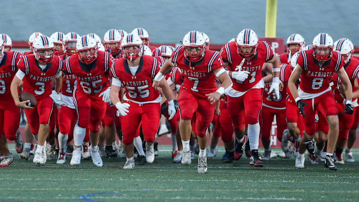 The Portsmouth varsity football team during its 2025 season opener.