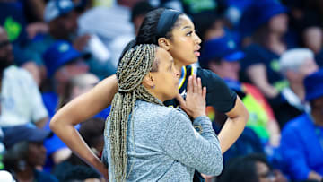 May 15, 2024; Arlington, Texas, USA; Chicago Sky head coach Teresa Weatherspoon speaks with Chicago Sky forward Angel Reese (5) during the second half against the Dallas Wings at College Park Center. Mandatory Credit: Kevin Jairaj-Imagn Images