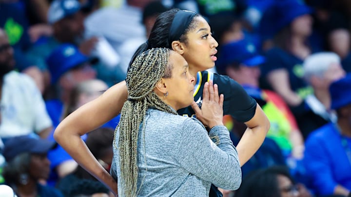 May 15, 2024; Arlington, Texas, USA; Chicago Sky head coach Teresa Weatherspoon speaks with Chicago Sky forward Angel Reese (5) during the second half against the Dallas Wings at College Park Center. Mandatory Credit: Kevin Jairaj-Imagn Images