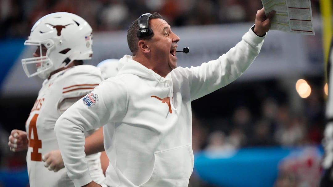 Texas head coach Steve Sarkisian directs his player Texas head coach Steve Sarkisian directs his player