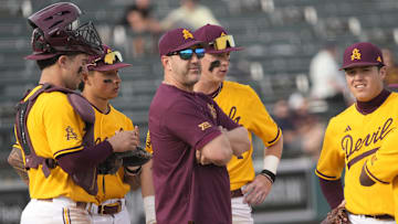 Arizona State manager Willie Bloomquist makes a pitching change during the seventh inning against Ohio State at Phoenix Municipal Stadium on Feb. 16, 2025.