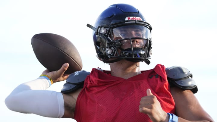 Chandler quarterback Dylan Raiola throws during a scrimmage 