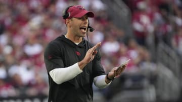Arizona Cardinals head coach Jonathan Gannon watches his team play against the San Francisco 49ers during the second quarter at State Farm Stadium in Glendale on Dec. 17, 2023.