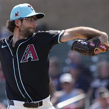 Arizona Diamondbacks pitcher Zac Gallen (23) throws against the Cleveland Guardians during a spring training game at Salt River Fields on Feb. 24, 2025.