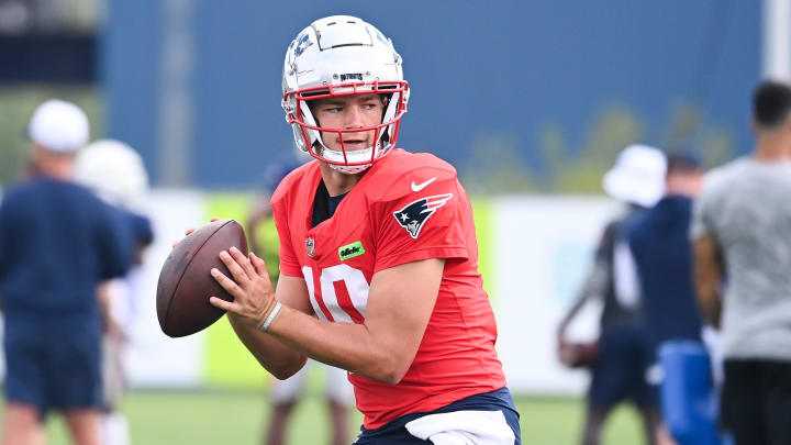 Aug 03, 2024; Foxborough, MA, USA; New England Patriots quarterback Drake Maye (10) throws a pass during training camp at Gillette Stadium. Mandatory Credit: Eric Canha-USA TODAY Sports