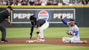 Arizona Diamondbacks Alek Thomas (5) is called out trying to steal second by umpire Ryan Blakney (36) as New York Mets shortstop Francisco Lindor (12) reacts during the ninth inning at Chase Field, May 5, 2025.