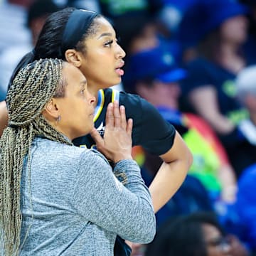 May 15, 2024; Arlington, Texas, USA; Chicago Sky head coach Teresa Weatherspoon speaks with Chicago Sky forward Angel Reese (5) during the second half against the Dallas Wings at College Park Center. Mandatory Credit: Kevin Jairaj-Imagn Images