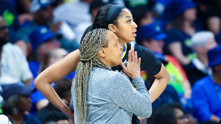 May 15, 2024; Arlington, Texas, USA; Chicago Sky head coach Teresa Weatherspoon speaks with Chicago Sky forward Angel Reese (5) during the second half against the Dallas Wings at College Park Center. Mandatory Credit: Kevin Jairaj-Imagn Images