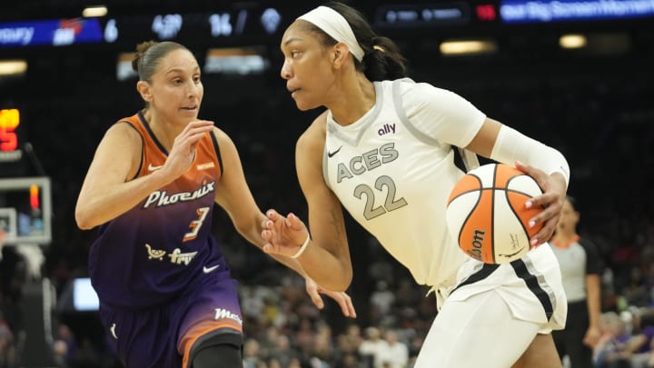 Phoenix Mercury guard Diana Taurasi (3) defends against Las Vegas Aces center A'ja Wilson (22) during the first quarter at Footprint Center on Sept. 1, 2024, in Phoenix.