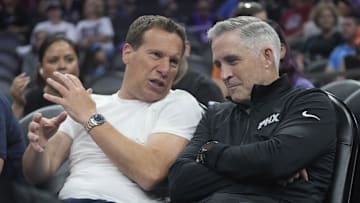 Phoenix Mercury and Suns owner Mat Ishbia (left) talks with new Suns general manager Brian Gregory during the second quarter between the Phoenix Mercury and the Minnesota Lynx at PHX Arena on July 9, 2025.