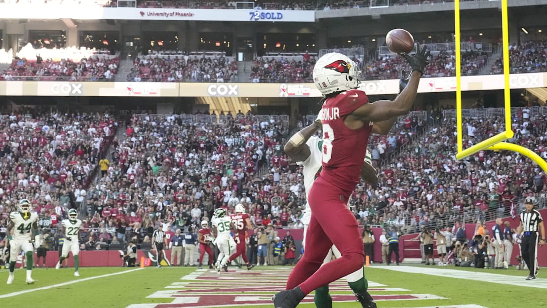 Arizona Cardinals wide receiver Marvin Harrison Jr. (18) catches a touchdown pass against New York Jets cornerback D.J. Reed (4) during the second quarter at State Farm Stadium on Nov 10, 2024, in Glendale. Arizona Cardinals wide receiver Marvin Harrison Jr. (18) catches a touchdown pass against New York Jets cornerback D.J. Reed (4) during the second quarter at State Farm Stadium on Nov 10, 2024, in Glendale.