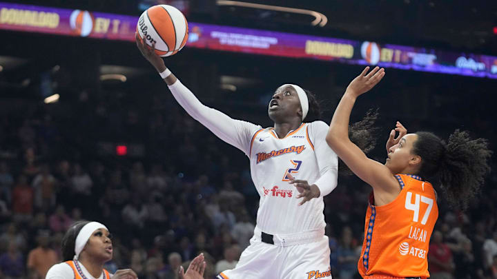 Phoenix Mercury guard Kahleah Copper (2) lays the ball in past Connecticut Sun guard Leila Lacan (47) during the first quarter at PHX Arena on Aug. 5, 2025, in Phoenix.