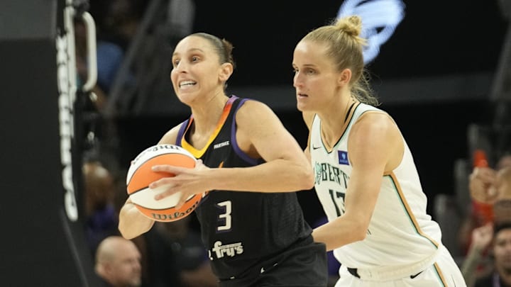 Phoenix Mercury guard Diana Taurasi (3) passes the ball up court in front of New York Liberty forward Leonie Fiebich (13) during the second quarter at Footprint Center on Aug. 26, 2024, in Phoenix