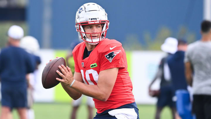 Aug 03, 2024; Foxborough, MA, USA; New England Patriots quarterback Drake Maye (10) throws a pass during training camp at Gillette Stadium. Mandatory Credit: Eric Canha-USA TODAY Sports