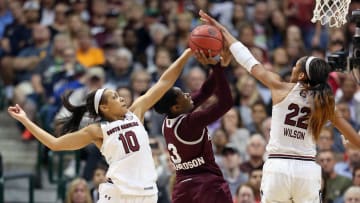 South Carolina basketball stars Allisha Gray and A'ja Wilson combining for a block against Mississippi State in the 2016-2017 National Championship Game