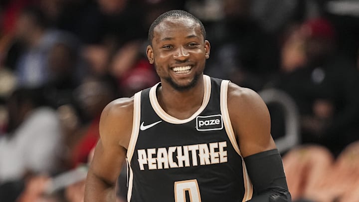 Feb 26, 2026; Atlanta, Georgia, USA; Atlanta Hawks forward Jonathan Kuminga (0) reacts after making a three point shot against the Washington Wizards during the first half at State Farm Arena. Mandatory Credit: Dale Zanine-Imagn Images
